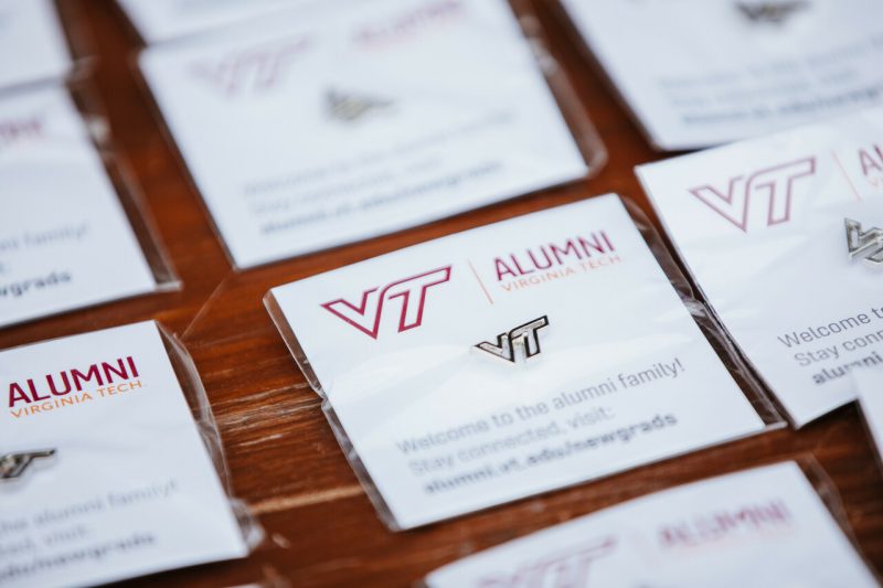 Name tags on a table with Virginia Tech logo