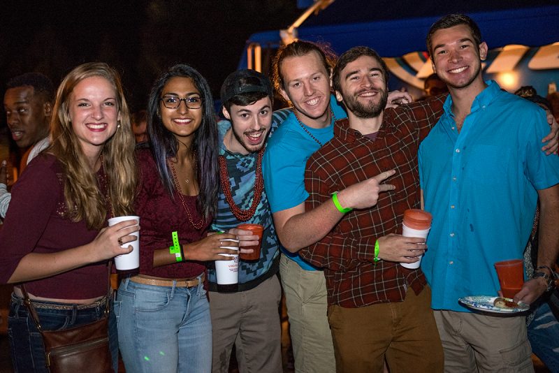 Young alums having fun at a late night event