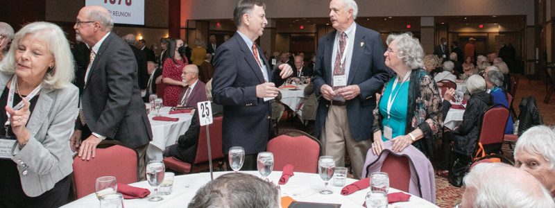 Cornerstone Alumni socialize during an event