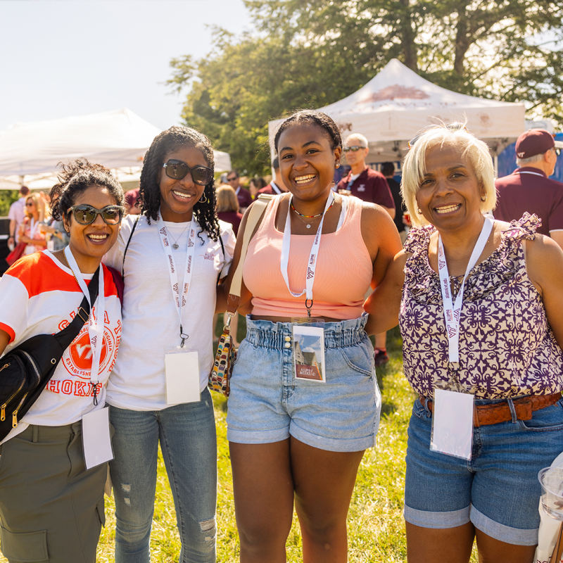 Alumni pose together at the Taste of Virginia