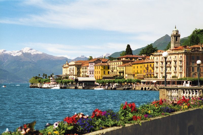 river with scenic town behind it