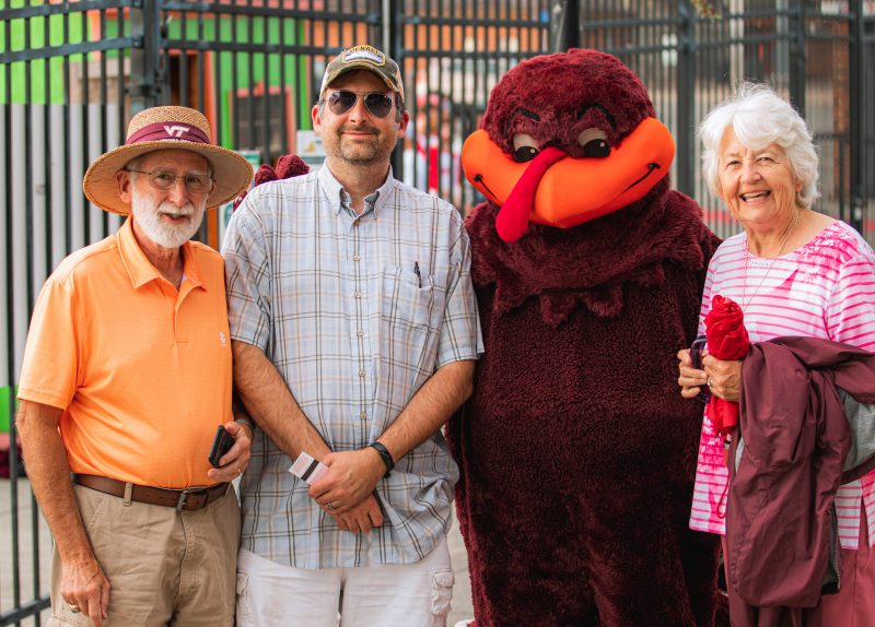 Cornerstone Hokies pose with the Hokie Bird
