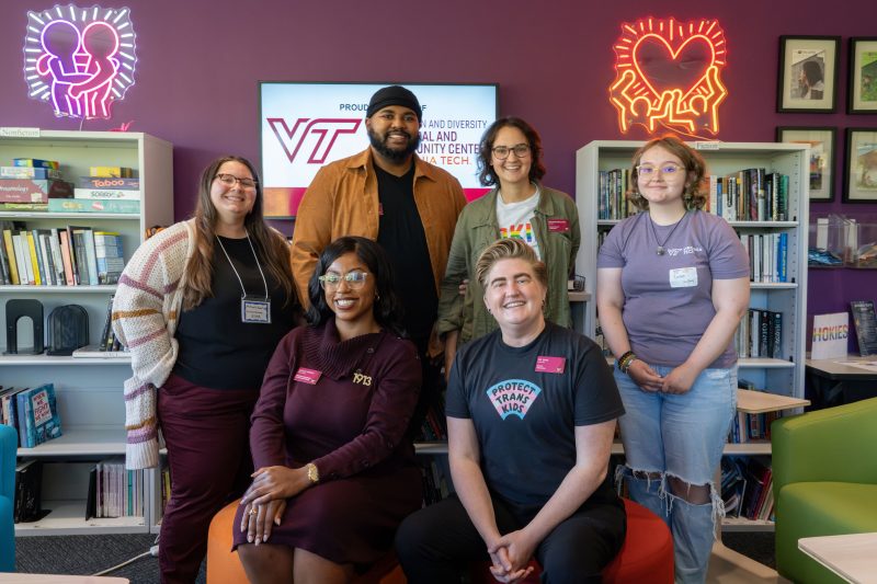 Inclusive community members pose together