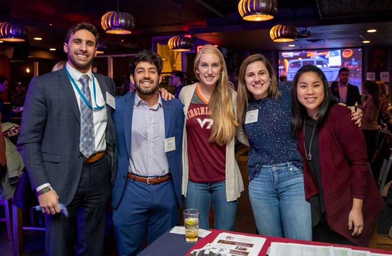 Young alumni at a networking event